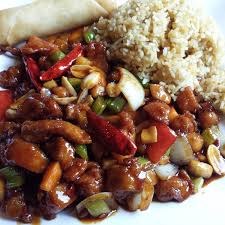 A Dragon Treasure plate of kung pao chicken with fried rice and an egg roll